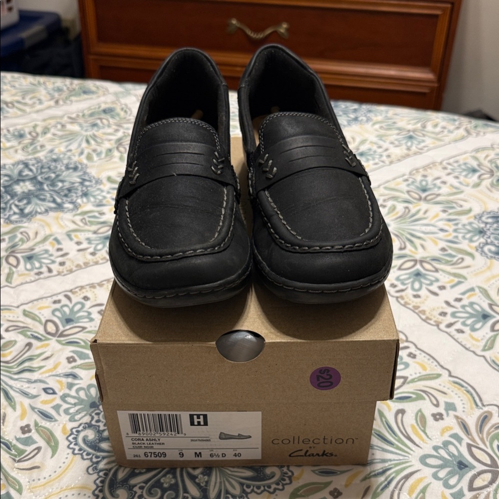 Clarks Cora Ashly black leather slip ons